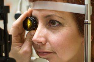 woman with low vision receiving an eye exam