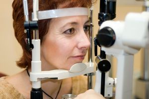 woman receiving an eye exam